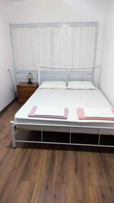 Postel nebo postele na pokoji v ubytování Vasilis traditional House