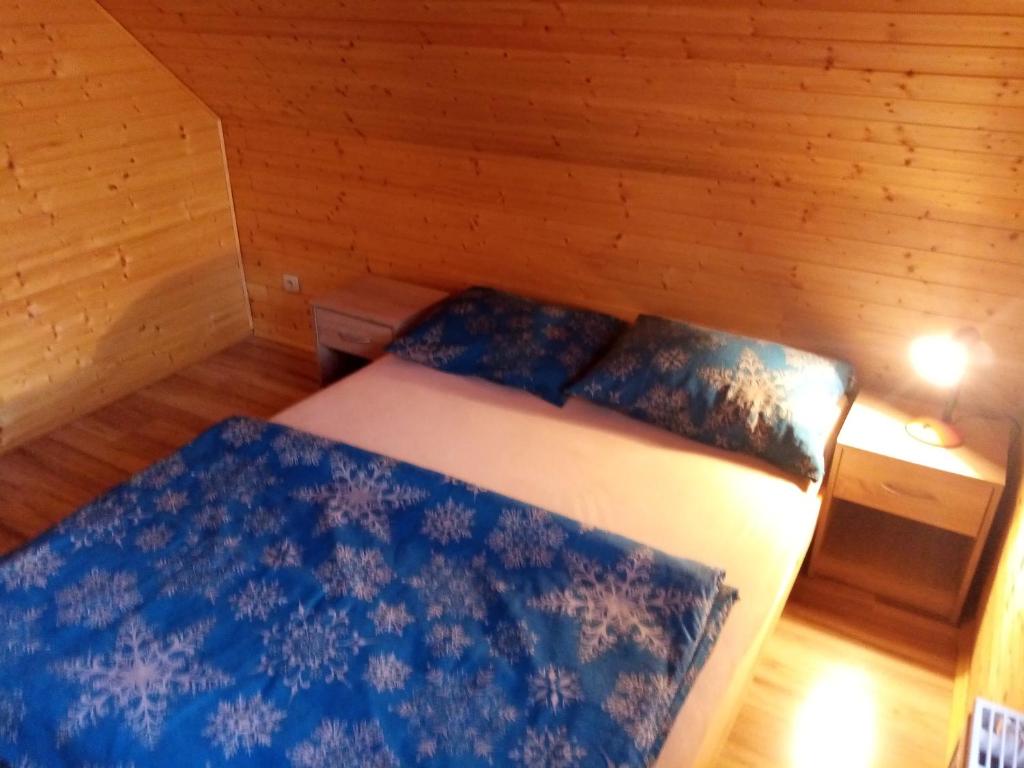 Postel nebo postele na pokoji v ubytování ROUBENKA-JESENKA II