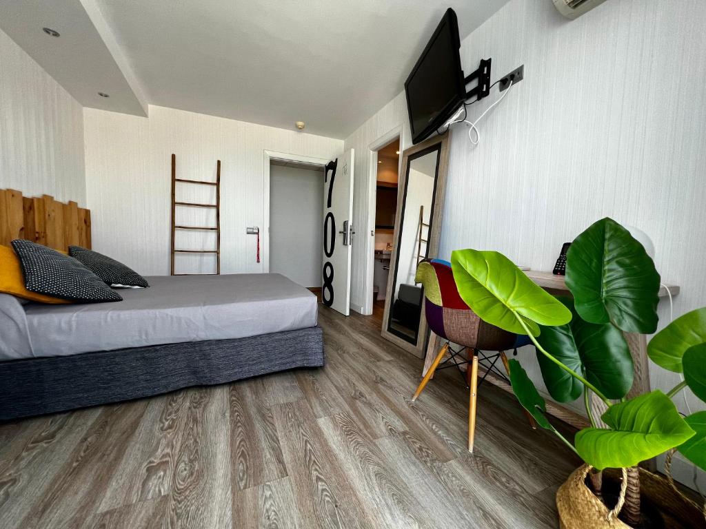 TV a/nebo společenská místnost v ubytování Hotel Hey Peñíscola