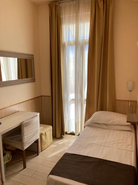 Postel nebo postele na pokoji v ubytování Hotel Adler