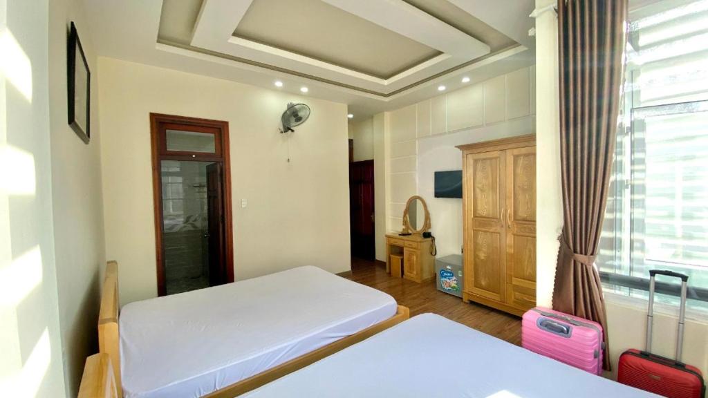 Postel nebo postele na pokoji v ubytování Thảo Nguyên
