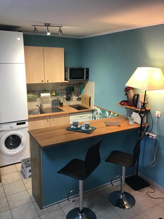 Kuchyňa alebo kuchynka v ubytovaní Superbe appartement à Uzès avec place de parking