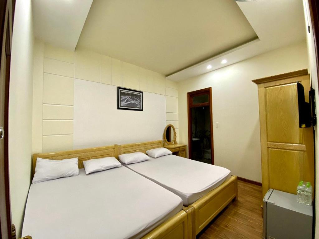 Postel nebo postele na pokoji v ubytování Thảo Nguyên