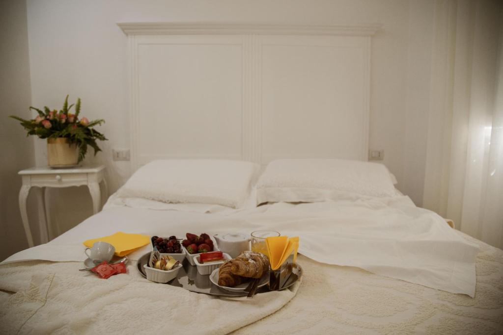 Postel nebo postele na pokoji v ubytování B&B L'ORIZZONTE