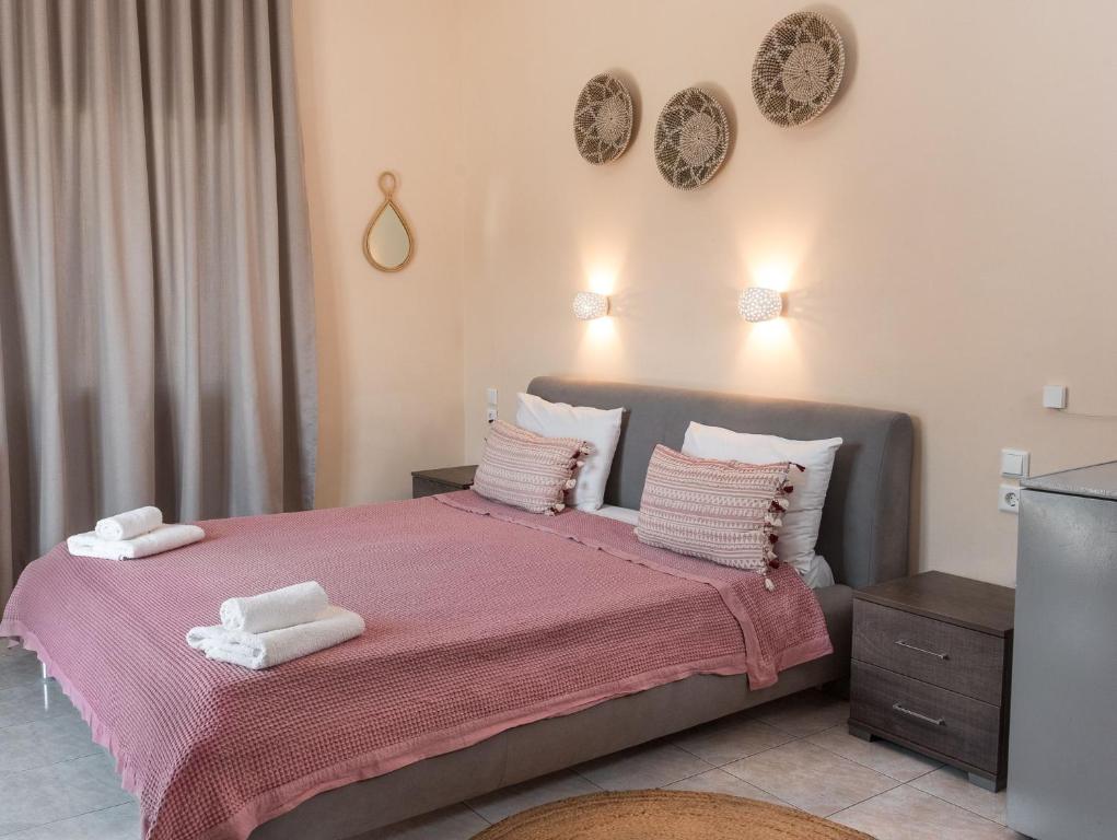 Postel nebo postele na pokoji v ubytování Theano Hotel