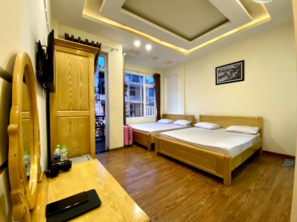 Postel nebo postele na pokoji v ubytování Thảo Nguyên