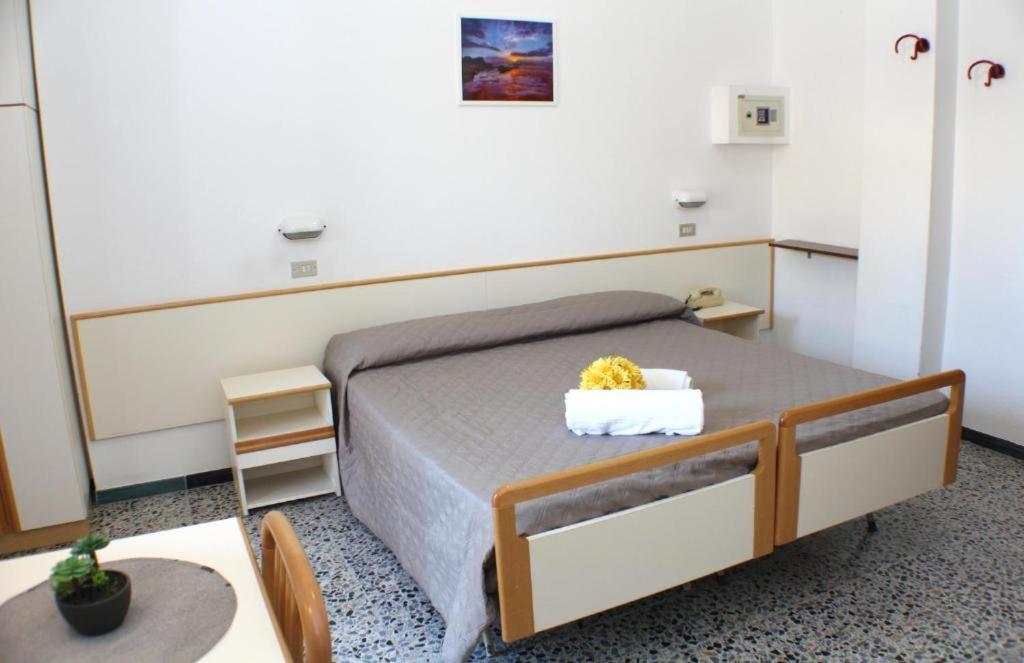 Postel nebo postele na pokoji v ubytování Hotel Caesar
