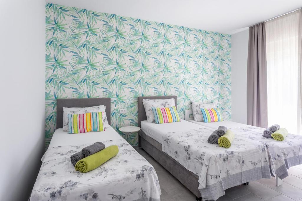 Postel nebo postele na pokoji v ubytování Hostel Villa Skansi