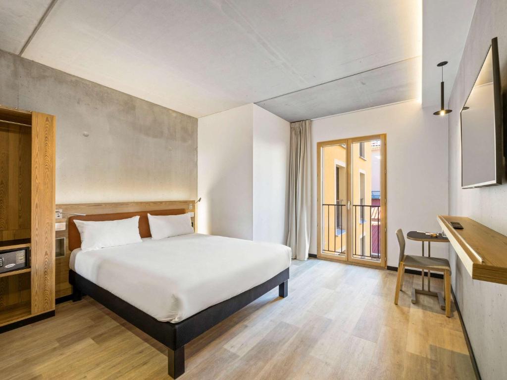 Postel nebo postele na pokoji v ubytování ibis Styles Ajaccio Napoleon