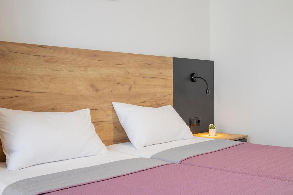 Postel nebo postele na pokoji v ubytování Villa Chrisanthi