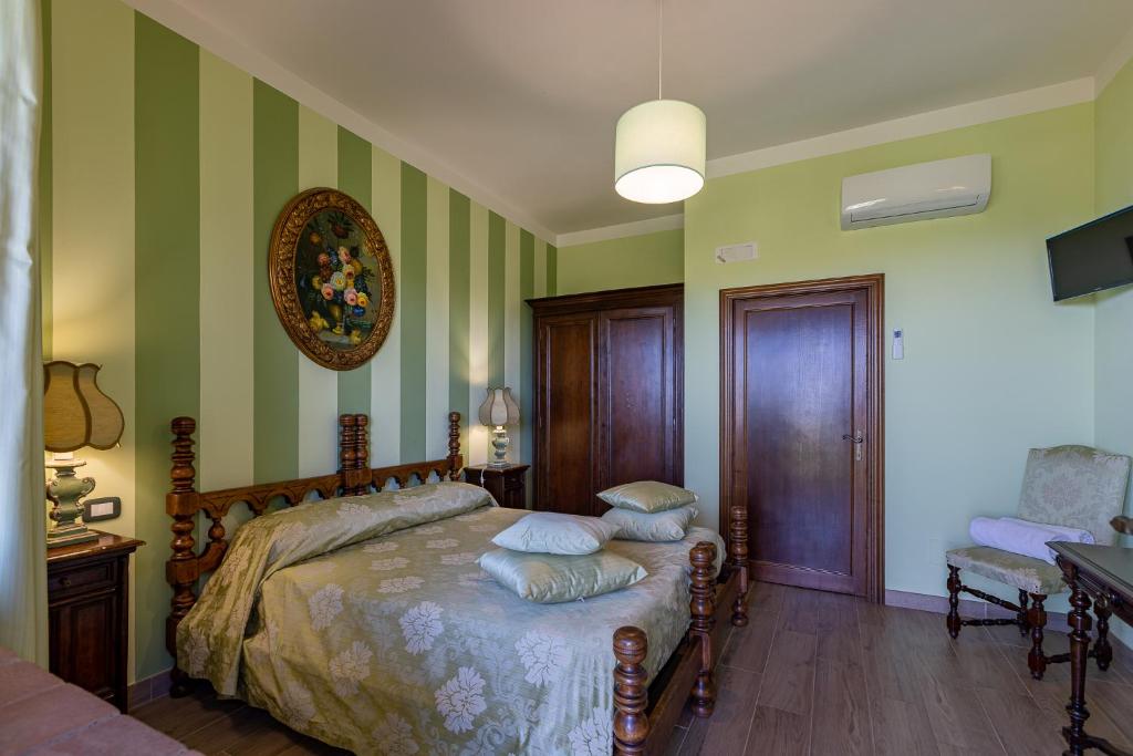 Postel nebo postele na pokoji v ubytování B&B FONTERONCONE di KRYVUTA OKSANA
