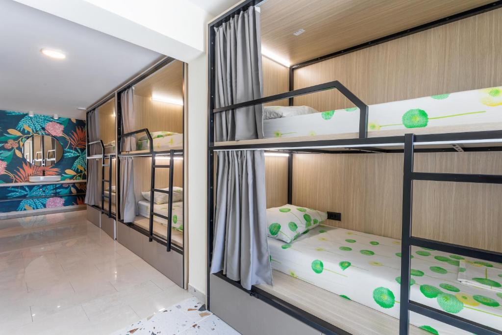 Postel nebo postele na pokoji v ubytování Hostel Villa Skansi