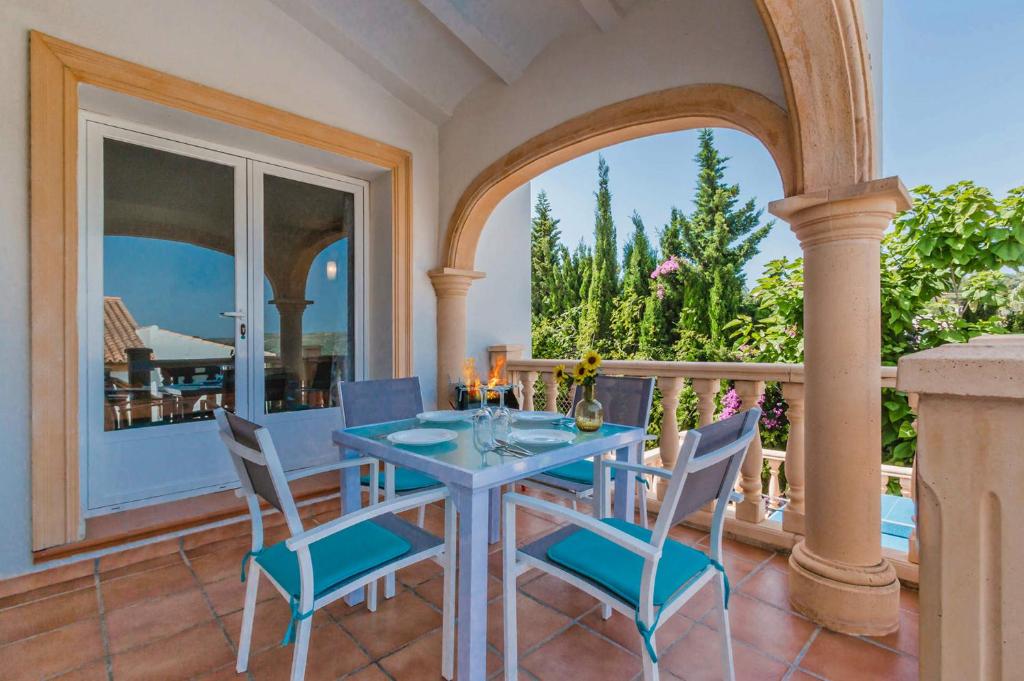A balcony or terrace at Villa Aneto by Villa Plus