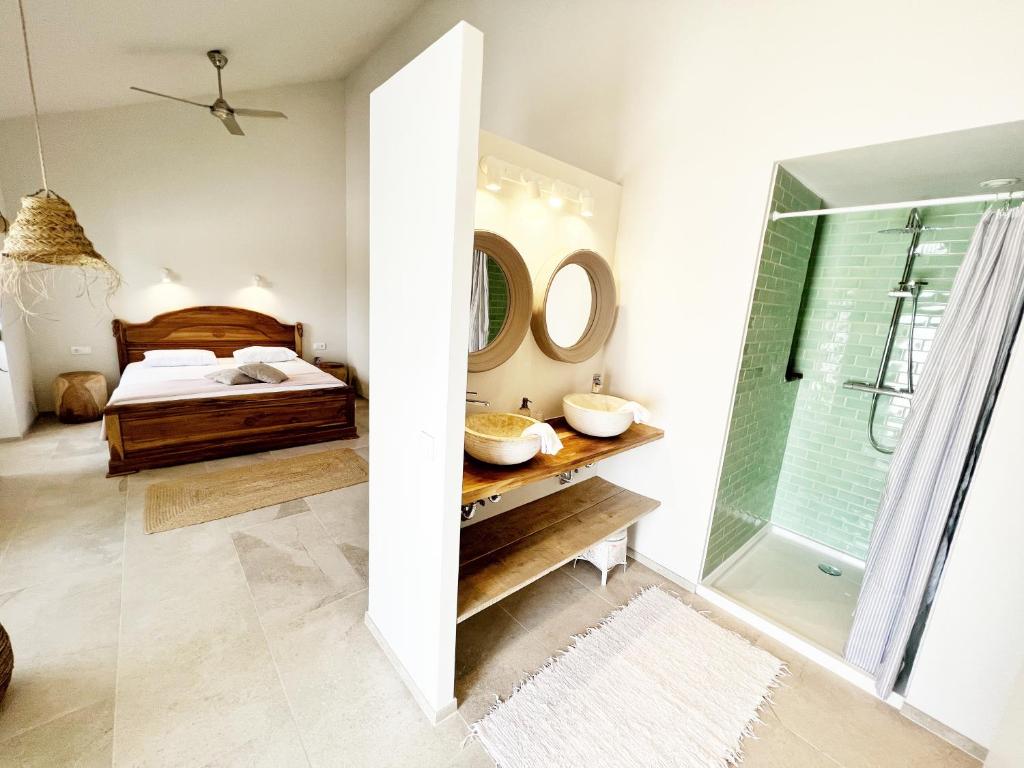Postel nebo postele na pokoji v ubytování Casa Tuia Resort