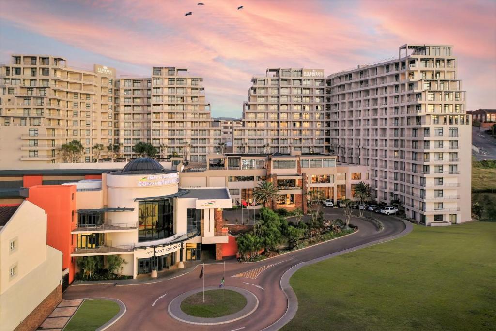 an aerial view of a city with tall buildings at Premier Hotel East London ICC in East London