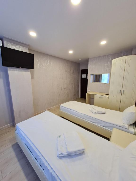 Postel nebo postele na pokoji v ubytování Hotel Lime