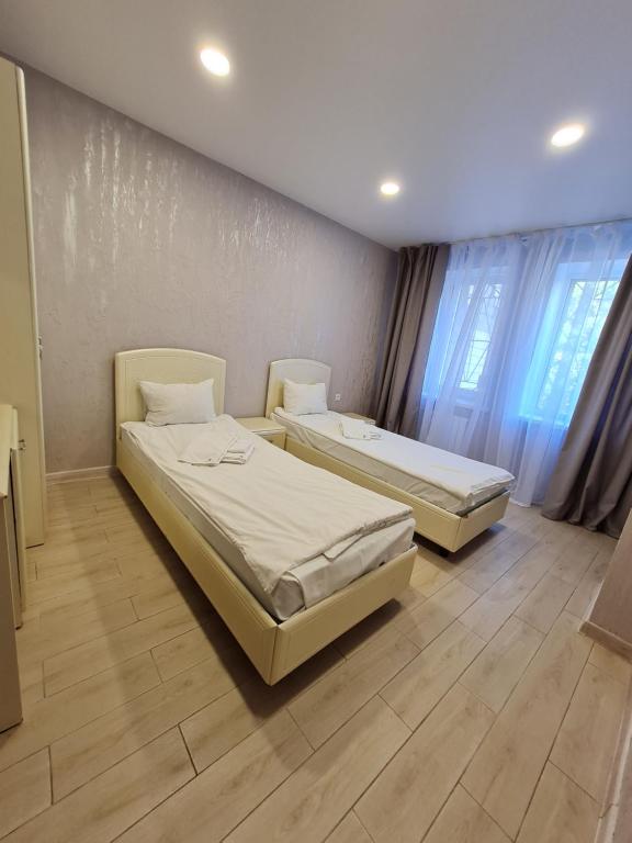 Postel nebo postele na pokoji v ubytování Hotel Lime