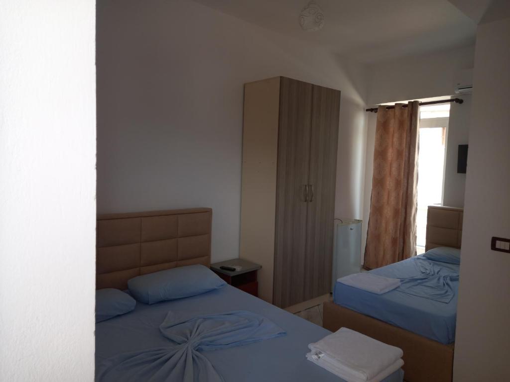 Postel nebo postele na pokoji v ubytování Bar Restorant Hotel Altini