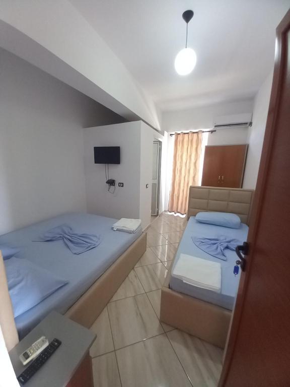 Postel nebo postele na pokoji v ubytování Bar Restorant Hotel Altini