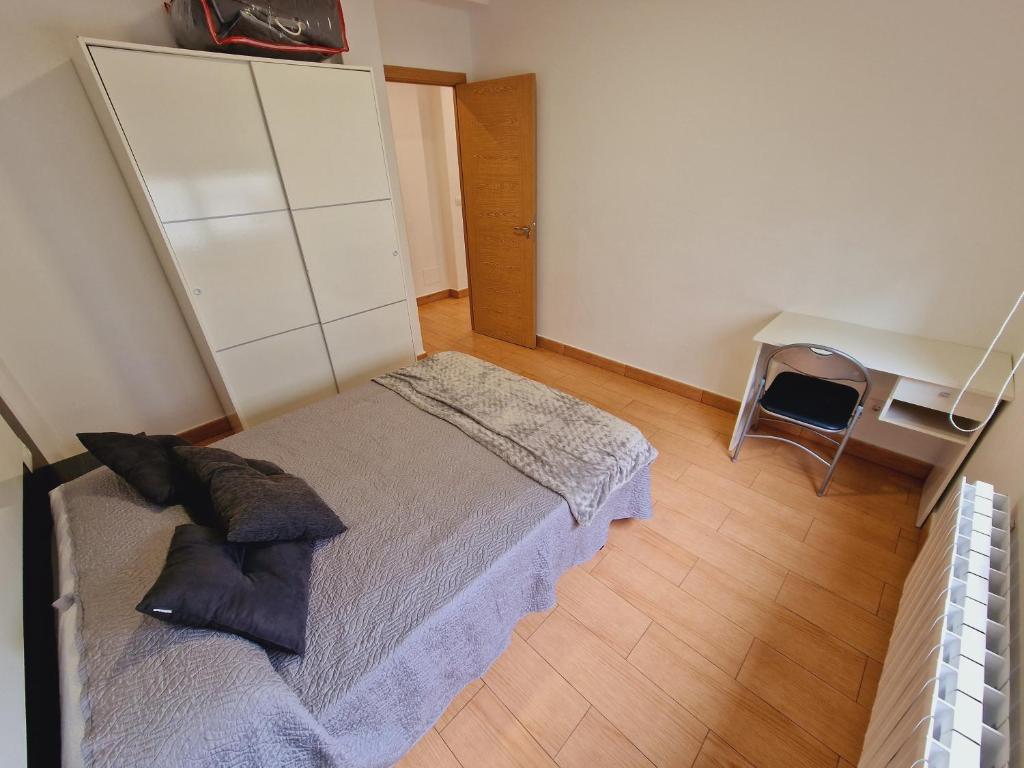 Posteľ alebo postele v izbe v ubytovaní Piso Reformado Pontevedra
