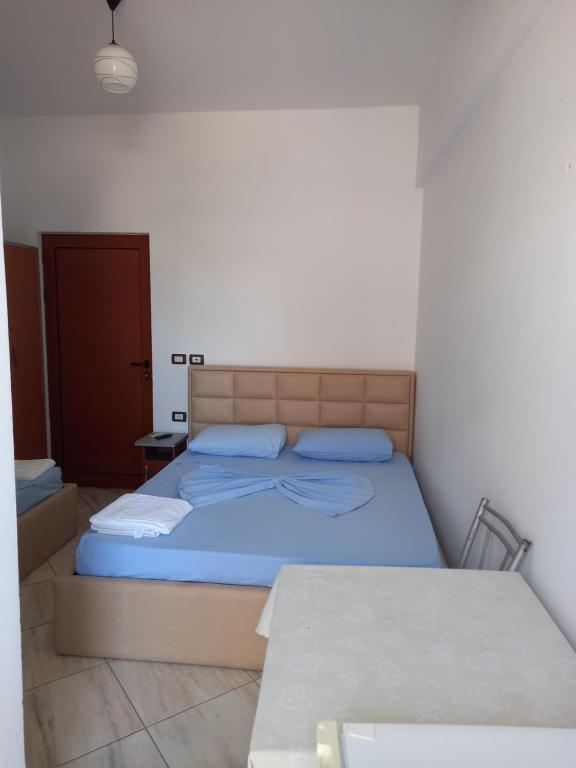 Postel nebo postele na pokoji v ubytování Bar Restorant Hotel Altini