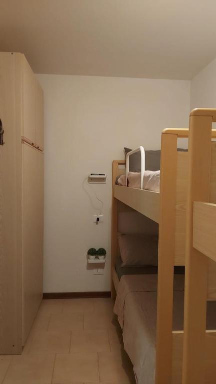 Posteľ alebo postele v izbe v ubytovaní Appartamento incantevole con ampio balcone