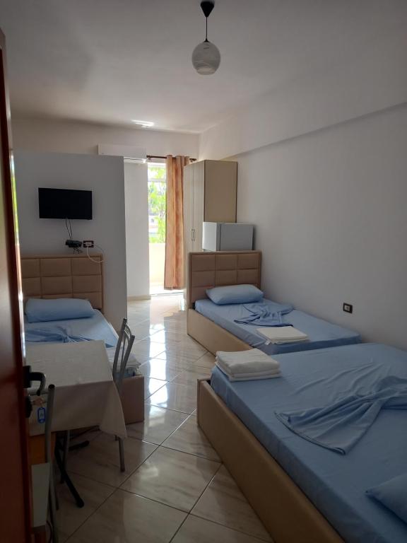 Postel nebo postele na pokoji v ubytování Bar Restorant Hotel Altini