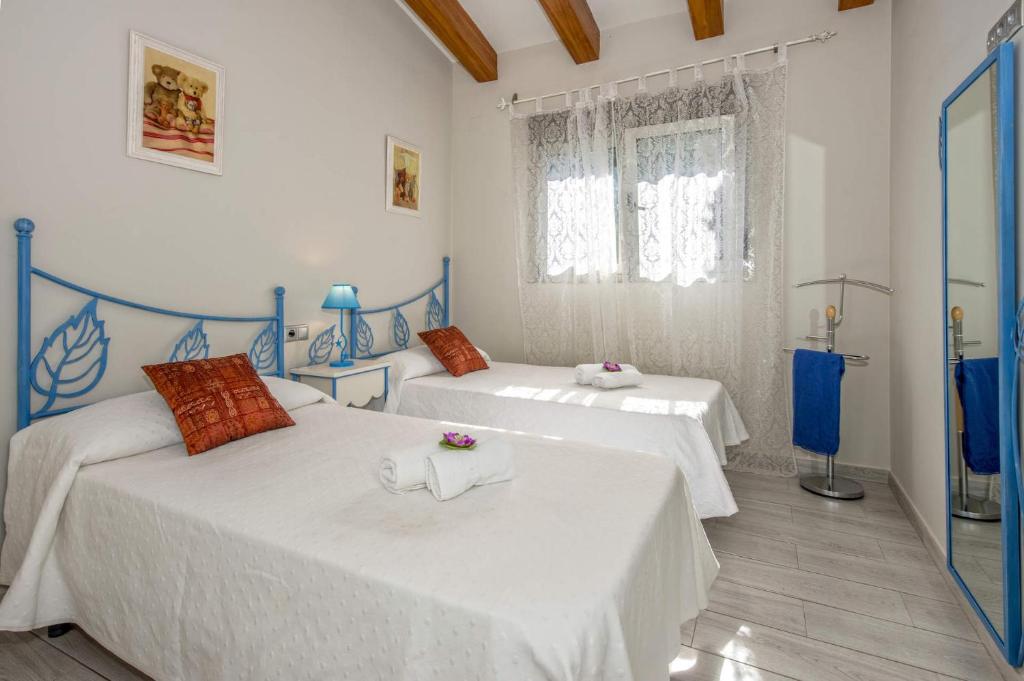 Postel nebo postele na pokoji v ubytování Villa Tosca by Villa Plus