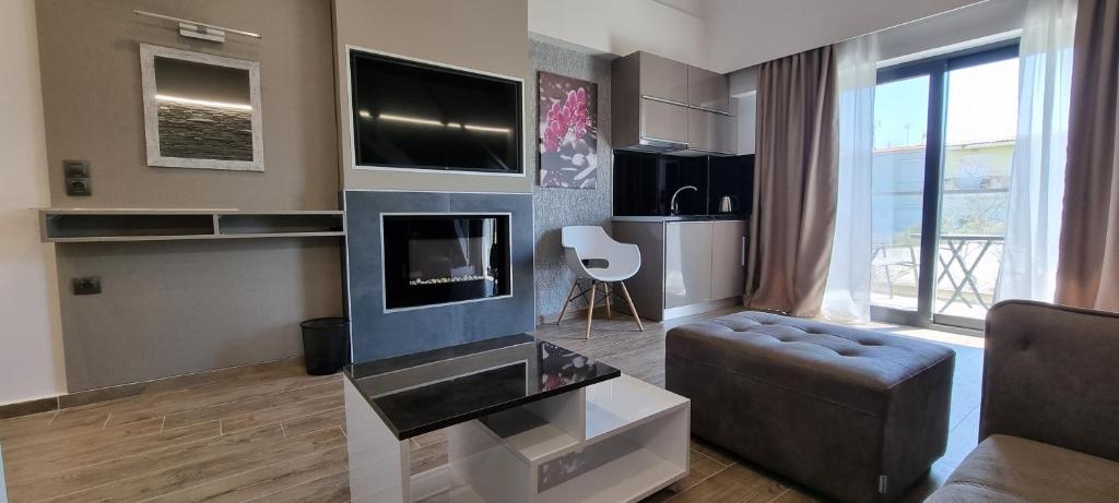 TV a/nebo společenská místnost v ubytování LUXSUITES