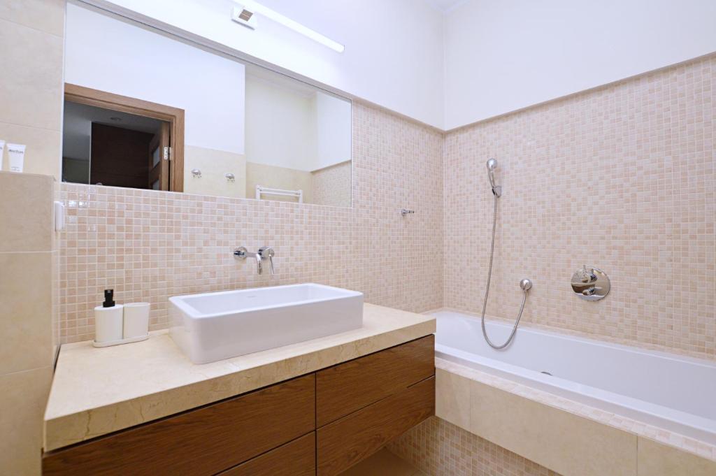 Kúpeľňa v ubytovaní Victus Apartamenty, Apartament Faro