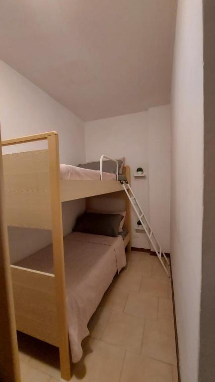 Posteľ alebo postele v izbe v ubytovaní Appartamento incantevole con ampio balcone