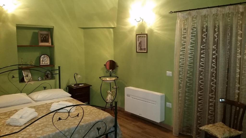 Postel nebo postele na pokoji v ubytování B&B Dhafna