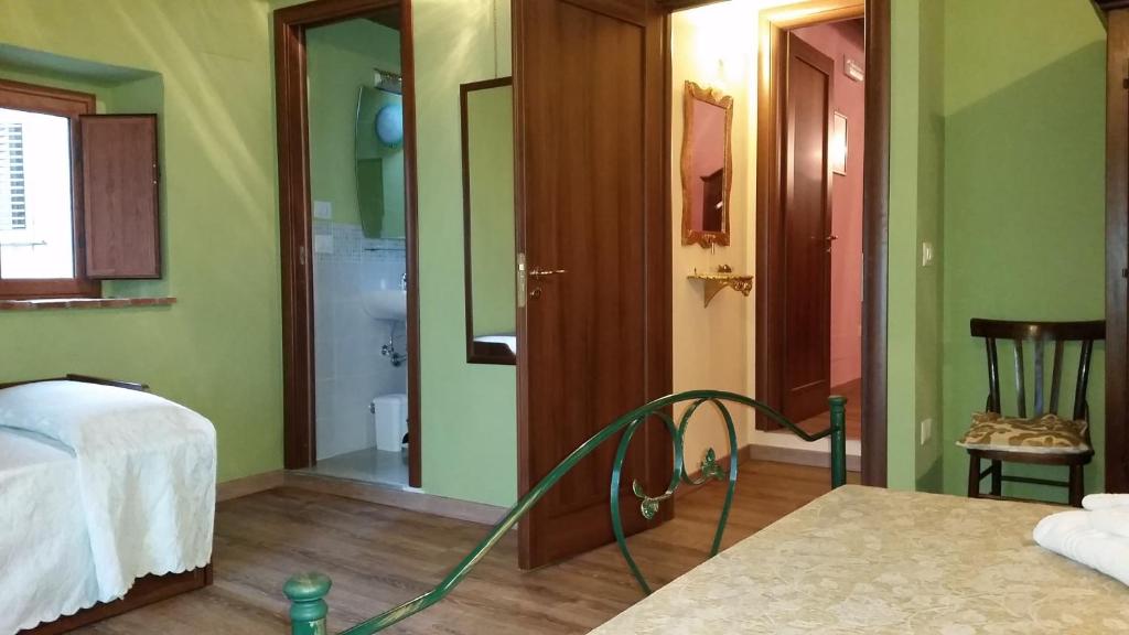 Postel nebo postele na pokoji v ubytování B&B Dhafna