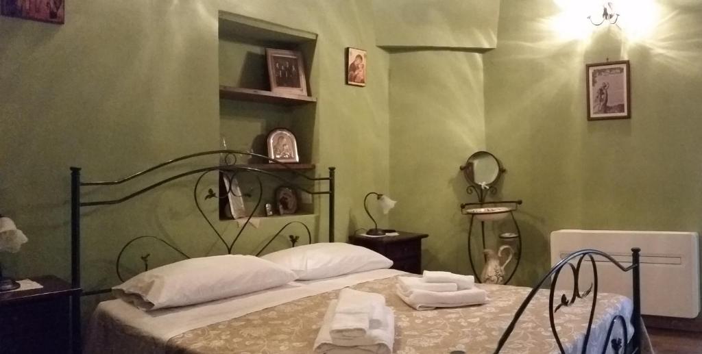 Postel nebo postele na pokoji v ubytování B&B Dhafna