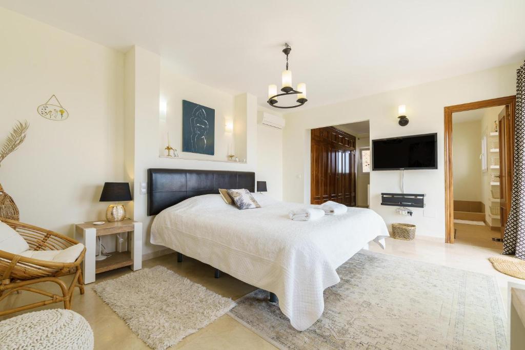 Posteľ alebo postele v izbe v ubytovaní Villa Mirador de Valtocado