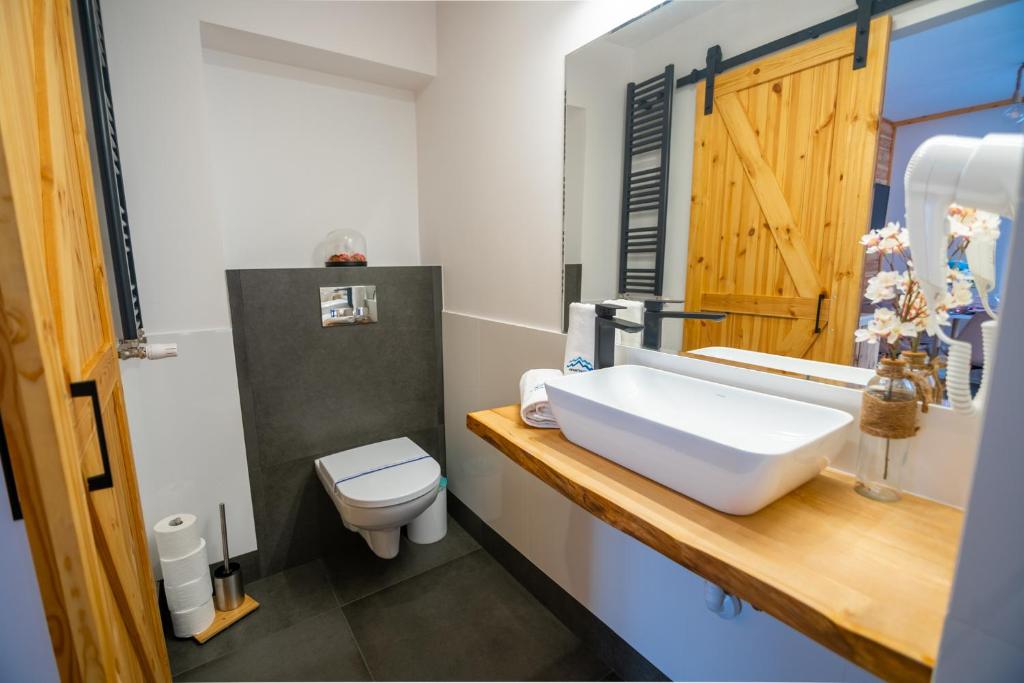 Kúpeľňa v ubytovaní Apart Invest Fanaberia
