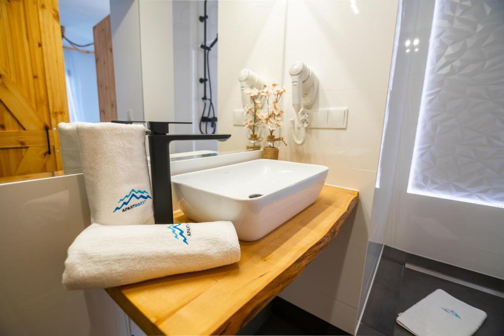Kúpeľňa v ubytovaní Apart Invest Fanaberia