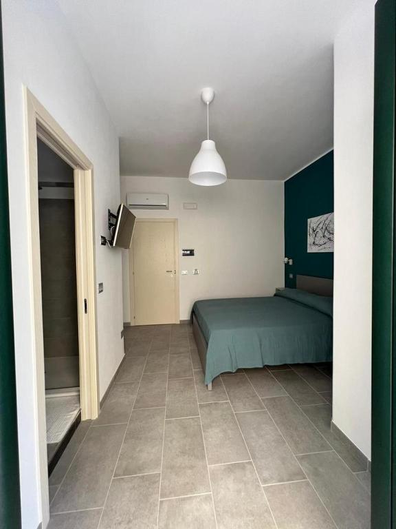 A bed or beds in a room at B&B 8 Marzo