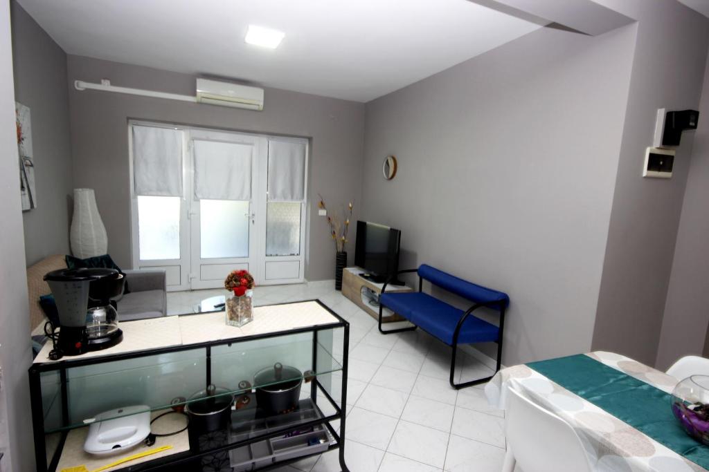 Postel nebo postele na pokoji v ubytování Apartments Fjolla