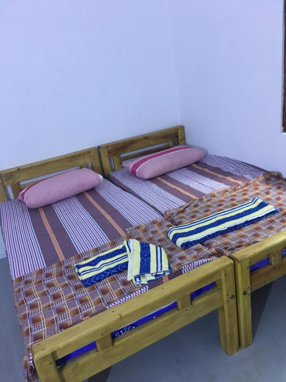 Postel nebo postele na pokoji v ubytování Joes Resthouse