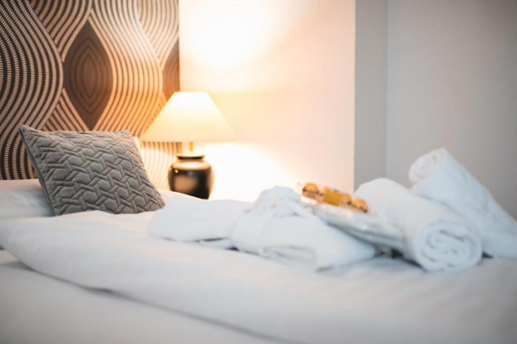Postel nebo postele na pokoji v ubytování Wellness hotel Lucia
