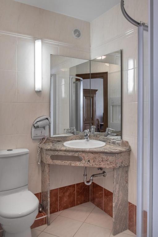 Koupelna v ubytování Hôtel au Heimbach
