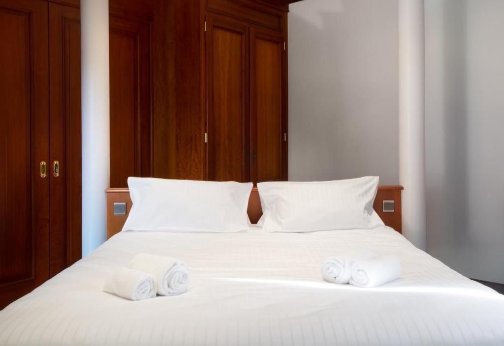 Postel nebo postele na pokoji v ubytování Hôtel au Heimbach