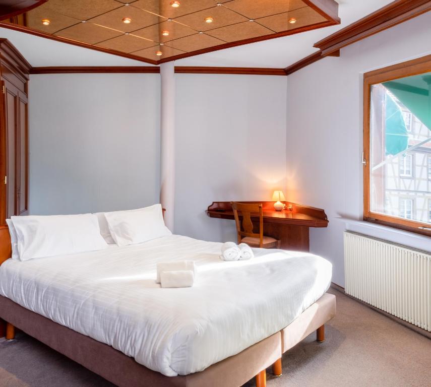 Postel nebo postele na pokoji v ubytování Hôtel au Heimbach