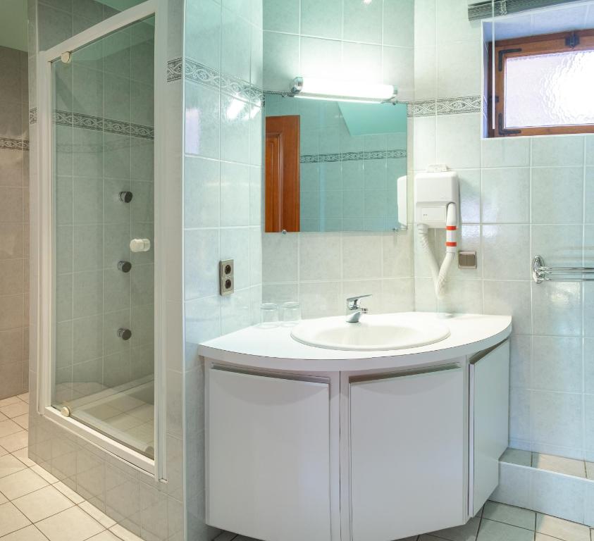 Koupelna v ubytování Hôtel au Heimbach