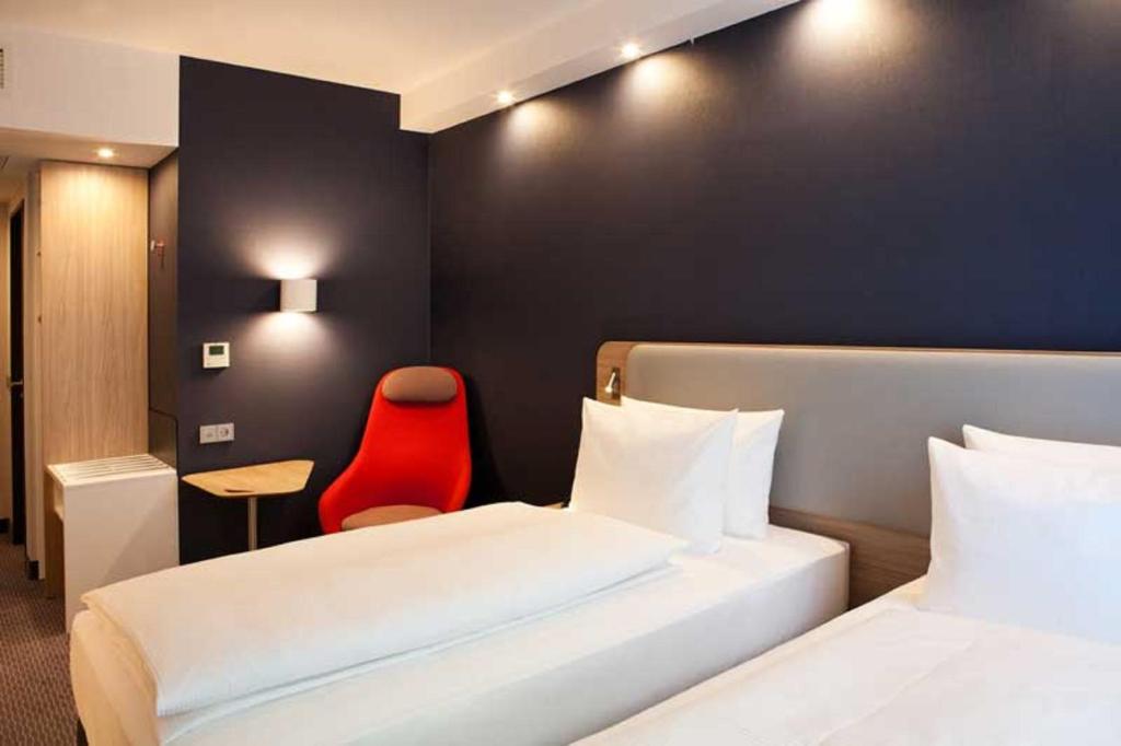 Postel nebo postele na pokoji v ubytování Holiday Inn Express Fürth by IHG