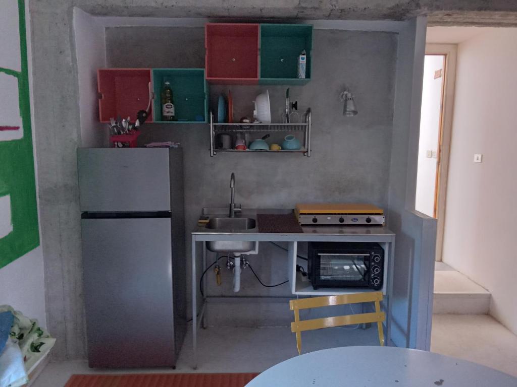 Kuchyňa alebo kuchynka v ubytovaní Casa Vacanze La Tonnara