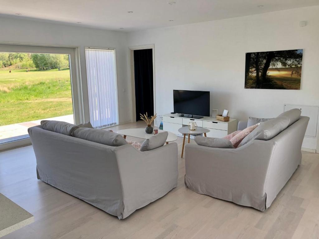 TV a/nebo společenská místnost v ubytování Kiladalens Golf & Lodge