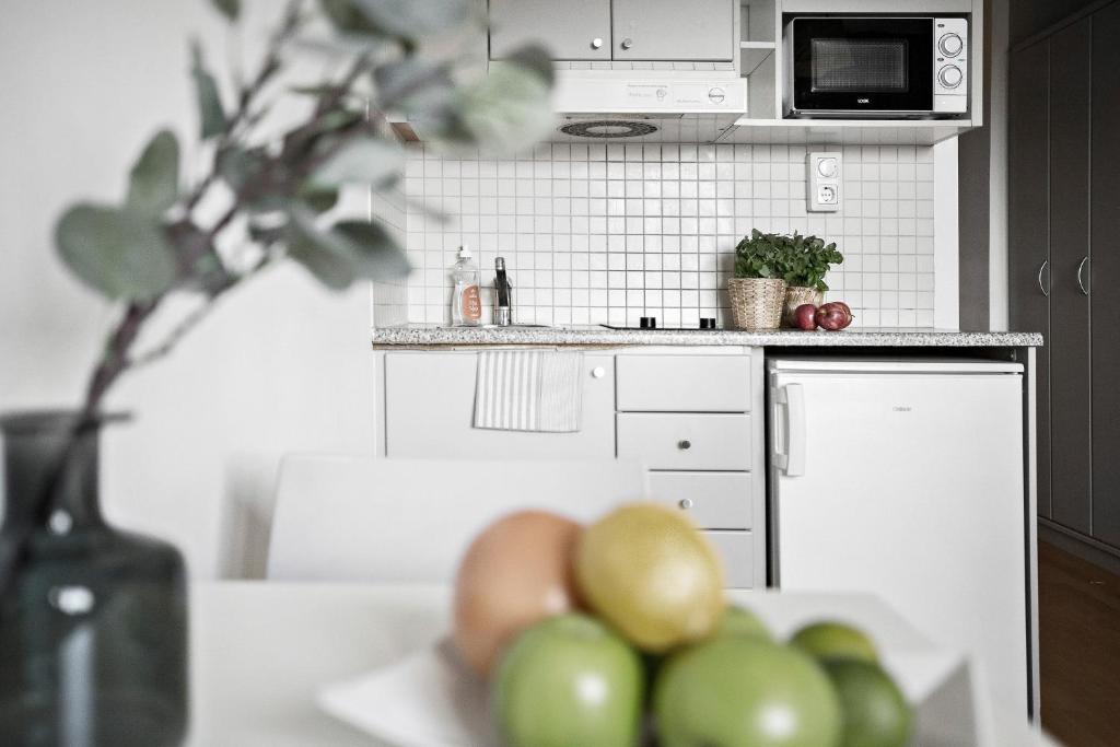 Kuchyň nebo kuchyňský kout v ubytování Forenom Aparthotel Stockholm Alvik