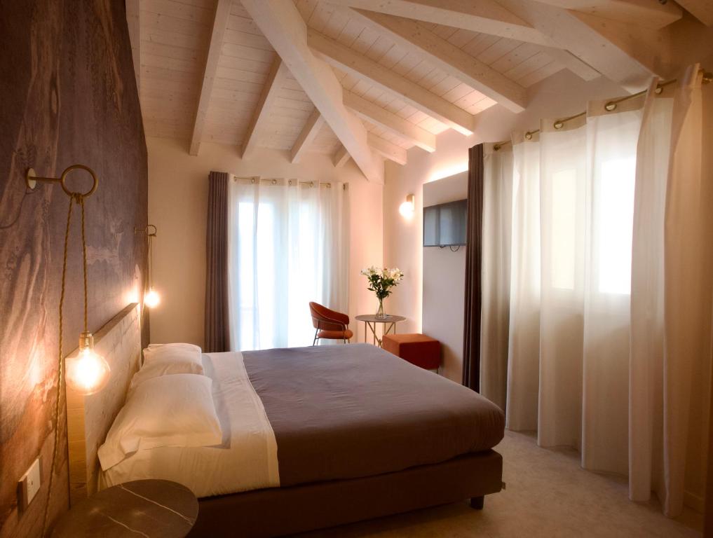 Postelja oz. postelje v sobi nastanitve Hotel Vittorio